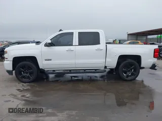2017 Chevrolet Silverado 1500 LT with VIN 3GCPCRECXHG385460, listed as a IAAI auction lot 41690171 with 108,673 mi miles and . Bid and sale history available at DreamBid. Image 14.