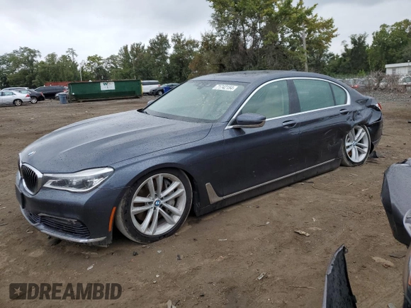 2016 BMW 7 Series 750i with VIN WBA7F0C54GGL99661, listed as a Copart auction lot 71742154 with 104,498 mi miles and Salvage Title. Bid and sale history available at carsss.com. Image 1.