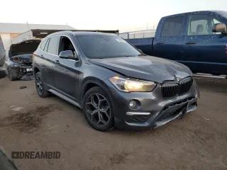 2018 BMW X1 xDrive28i with VIN WBXHT3C38J3H33310, listed as a Copart auction lot 73492324 with 88,620 mi miles and Salvage Title. Bid and sale history available at carsss.com. Image 4.