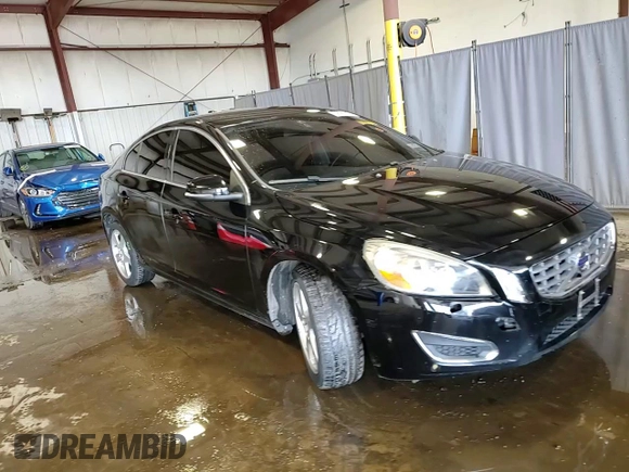 2013 Volvo S60 T5 Premier z VIN YV1612FS1D1220589, wystawiony jako Copart lot #58983665 z przebiegiem 81 341 mil mil oraz Szkoda całkowita • Salvage title. Historia ofert i sprzedaży dostępna na DreamBid. Obrazek 13.