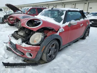2010 MINI Convertible with VIN WMWMR3C57ATU97979, listed as a Copart auction lot 45903855 with 154,614 mi miles and Salvage Title. Bid and sale history available at DreamBid. Image 1.