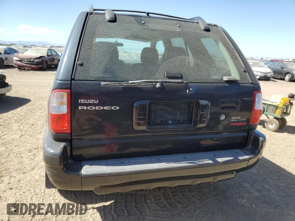 2001 Isuzu Rodeo S with VIN 4S2DM58W914354772, listed as a Copart auction lot 72208564 with 146,507 mi miles and Salvage Title. Bid and sale history available at carsss.com. Image 6.
