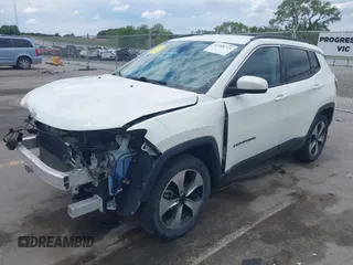 2018 Jeep Compass Altitude with VIN 3C4NJDBB4JT232968, listed as a IAAI auction lot 42388364 with 89,942 mi miles and . Bid and sale history available at DreamBid. Image 2.