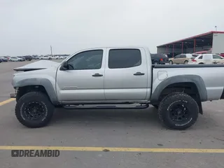 2006 Toyota Tacoma PreRunner z VIN 3TMJU62NX6M018693, wystawiony jako IAAI lot #42184797 z przebiegiem 193 953 mil mil oraz . Historia ofert i sprzedaży dostępna na DreamBid. Obrazek 15.