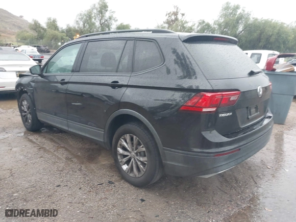 2018 Volkswagen Tiguan S with VIN 3VV1B7AX0JM101932, listed as a IAAI auction lot 41725112 with 143,780 mi miles. Bid and sale history available at carsss.com. Image 3.