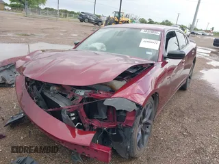 2020 Dodge Charger SXT with VIN 2C3CDXBG2LH136073, listed as a IAAI auction lot 41900921 with 55,747 mi miles and . Bid and sale history available at carsss.com. Image 2.