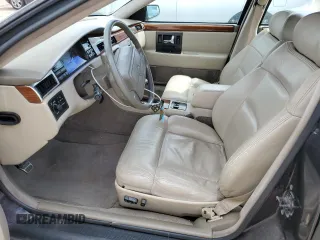 1992 Cadillac Seville z VIN 1G6KY53BXNU804126, wystawiony jako Copart lot #69219394 z przebiegiem 100 647 mil mil oraz Czysty tytuł • Clean title. Historia ofert i sprzedaży dostępna na DreamBid. Obrazek 7.