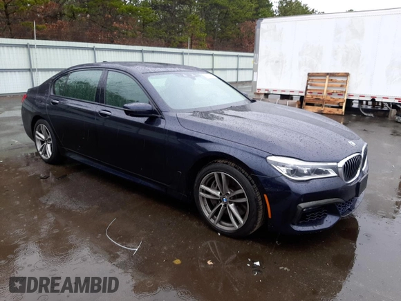 2016 BMW 7 Series 750i xDrive with VIN WBA7F2C58GG416876, listed as a Copart auction lot 37267523 with 77,741 mi miles. Bid and sale history available at carsss.com. Image 4.