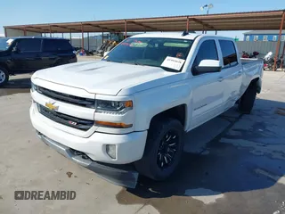 2016 Chevrolet Silverado 1500 LT with VIN 3GCUKREC8GG366278, listed as a IAAI auction lot 41993038 with 176,515 mi miles and . Bid and sale history available at DreamBid. Image 2.