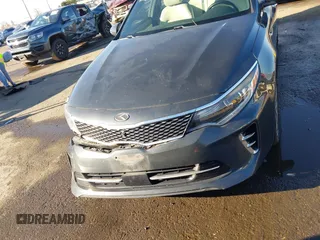 2016 Kia Optima SXL Turbo with VIN 5XXGV4L2XGG051938, listed as a IAAI auction lot 41400484 with 114,722 mi miles. Bid and sale history available at carsss.com. Image 12.