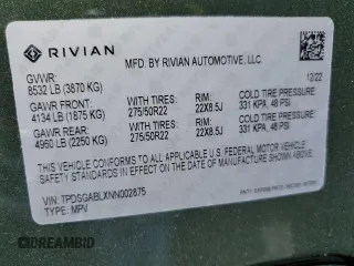 2022 Rivian R1S Launch Edition z VIN 7PDSGABLXNN002875, wystawiony jako Copart lot #55218465 z przebiegiem 25 988 mil mil oraz Szkody całkowita. Historia ofert i sprzedaży dostępna na DreamBid. Obrazek 13.