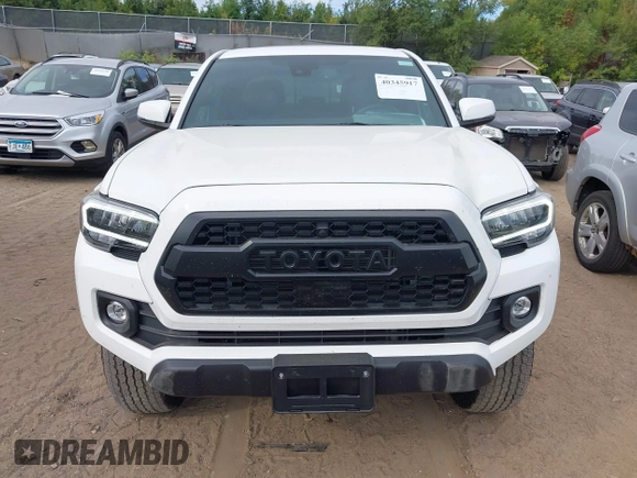 2023 Toyota Tacoma SR z VIN 3TMCZ5AN1PM637609, wystawiony jako IAAI lot #40345917 z przebiegiem 12 614 mil mil oraz . Historia ofert i sprzedaży dostępna na DreamBid. Obrazek 12.