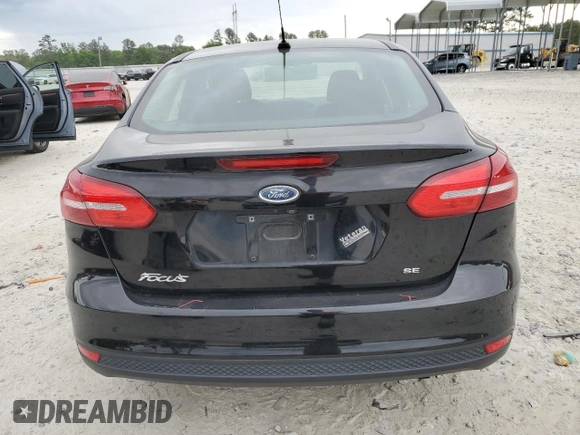 2017 Ford Focus SE with VIN 1FADP3F22HL291799, listed as a Copart auction lot 53789195 with 81,646 mi miles and Salvage title. Bid and sale history available at DreamBid. Image 6.