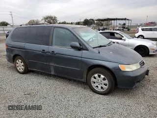 2003 Honda Odyssey EX-L with VIN 5FNRL187X3B122098, listed as a Copart auction lot 47975285 with Not provided miles and Salvage title. Bid and sale history available at DreamBid. Image 4.