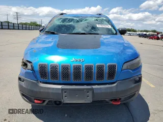 2021 Jeep Cherokee Trailhawk with VIN 1C4PJMBXXMD110436, listed as a Copart auction lot 57829375 with 46,647 mi miles and Salvage title. Bid and sale history available at DreamBid. Image 5.