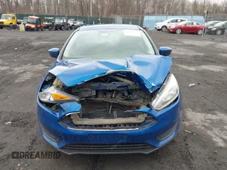 2018 Ford Focus SE z VIN 1FADP3F23JL200674, wystawiony jako IAAI lot #42009238 z przebiegiem 78 007 mil mil oraz . Historia ofert i sprzedaży dostępna na DreamBid. Obrazek 12.