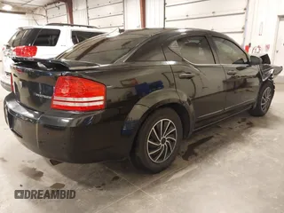 2009 Dodge Avenger SE with VIN 1B3LC46B29N525809, listed as a IAAI auction lot 41918533 with 147,269 mi miles and . Bid and sale history available at carsss.com. Image 4.