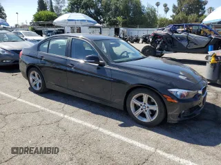 2014 BMW 3 Series 328i with VIN WBA3C1G56ENR49944, listed as a Copart auction lot 60330895 with 50,692 mi miles and Salvage title. Bid and sale history available at DreamBid. Image 4.