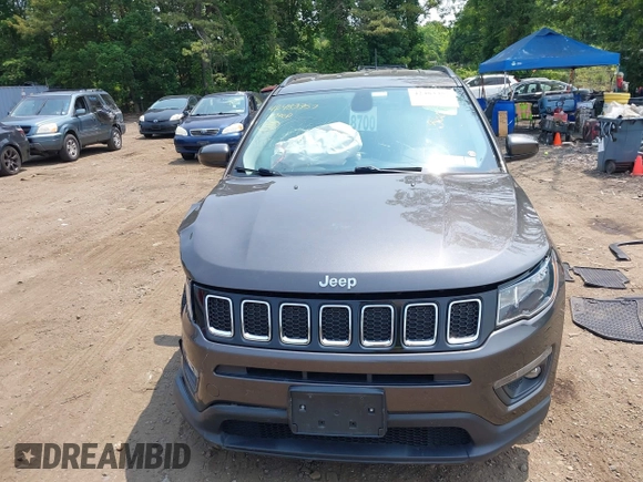 2019 Jeep Compass Altitude with VIN 3C4NJDBB1KT734970, listed as a IAAI auction lot 42483357 with 59,425 mi miles and . Bid and sale history available at DreamBid. Image 12.