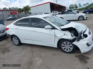 2015 Hyundai Accent GLS with VIN KMHCT4AE9FU808981, listed as a IAAI auction lot 41930246 with 160,406 mi miles. Bid and sale history available at carsss.com. Image 6.