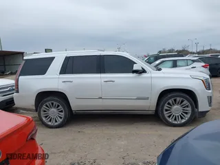 2016 Cadillac Escalade Platinum with VIN 1GYS3DKJ0GR405742, listed as a IAAI auction lot 41639802 with 77,576 mi miles. Bid and sale history available at carsss.com. Image 13.