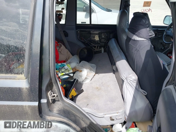 1997 Jeep Cherokee Sport with VIN 1J4FJ68S9VL517300, listed as a IAAI auction lot 42003493 with Not provided miles and . Bid and sale history available at DreamBid. Image 8.