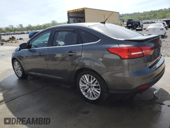 2015 Ford Focus Titanium с VIN 1FADP3J2XFL200668, выставлен на аукционе Copart как лот 54010865 с пробегом 138 459 миль миль и Списание • Salvage title. История ставок и продаж доступна на DreamBid. Изображение 2.