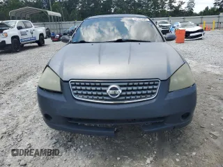 2006 Nissan Altima S with VIN 1N4AL11D76C205718, listed as a Copart auction lot 60190495 with 194,247 mi miles and Salvage title. Bid and sale history available at DreamBid. Image 5.