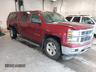 2014 Chevrolet Silverado 1500 LT with VIN 3GCUKREC9EG358476, listed as a IAAI auction lot 41866756 with 210,880 mi miles and . Bid and sale history available at DreamBid. Image 1.