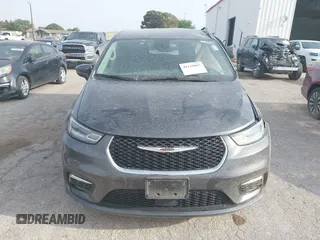 2023 Chrysler Pacifica Hybrid Touring L z VIN 2C4RC1L73PR598923, wystawiony jako IAAI lot #42124867 z przebiegiem 51 173 mil mil oraz . Historia ofert i sprzedaży dostępna na DreamBid. Obrazek 12.