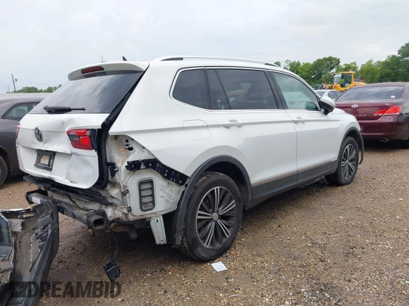 2019 Volkswagen Tiguan SE with VIN 3VV3B7AX6KM018161, listed as a IAAI auction lot 42279398 with 96,534 mi miles and . Bid and sale history available at DreamBid. Image 4.