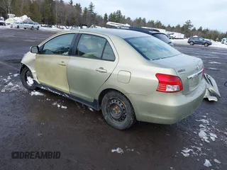2008 Toyota Yaris with VIN JTDBT923381263617, listed as a IAAI auction lot 41520448 with 153,897 mi miles. Bid and sale history available at carsss.com. Image 3.