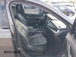 2020 Cadillac XT6 AWD Premium Luxury with VIN 1GYKPDRS2LZ205541, listed as a IAAI auction lot 41224342 with 53,947 mi miles and . Bid and sale history available at DreamBid. Image 5.