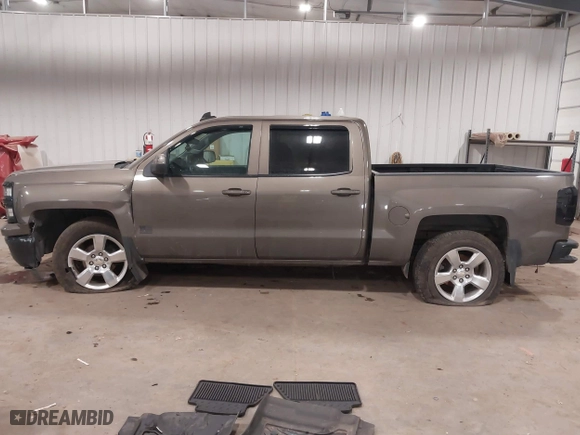 2015 Chevrolet Silverado 1500 LT with VIN 3GCUKREC3FG526470, listed as a IAAI auction lot 41242998 with 131,381 mi miles. Bid and sale history available at carsss.com. Image 14.