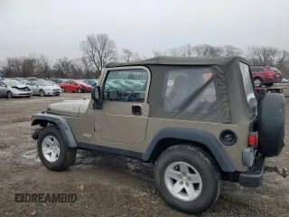 2004 Jeep Wrangler Rubicon with VIN 1J4FA69S24P743345, listed as a Copart auction lot 87067154 with 153,783 mi miles and Salvage Title. Bid and sale history available at carsss.com. Image 2.