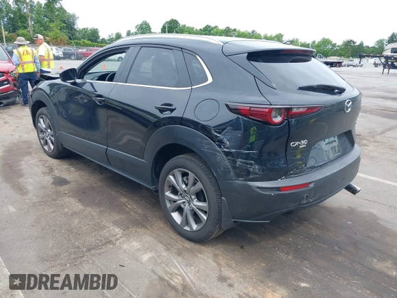 2024 Mazda CX-30 S Preferred z VIN 3MVDMBCM3RM663118, wystawiony jako IAAI lot #42336540 z przebiegiem 11 096 mil mil oraz . Historia ofert i sprzedaży dostępna na DreamBid. Obrazek 3.