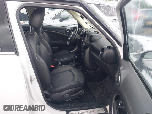 2013 MINI Countryman S ALL4 with VIN WMWZC5C50DWP30199, listed as a IAAI auction lot 42399104 with 103,367 mi miles and . Bid and sale history available at DreamBid. Image 5.