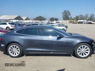 2019 Tesla Model S 75D with VIN 5YJSA1E25KF304371, listed as a IAAI auction lot 42349856 with 64,788 mi miles and . Bid and sale history available at DreamBid. Image 14.