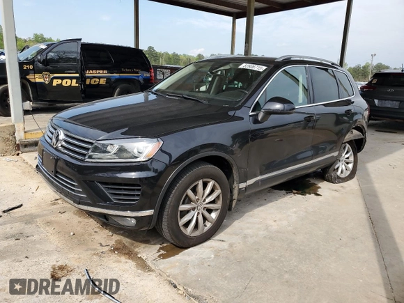 2016 Volkswagen Touareg Sport with VIN WVGEF9BP3GD007543, listed as a Copart auction lot 52806715 with 121,404 mi miles and Salvage Title. Bid and sale history available at DreamBid. Image 1.