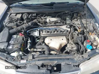 1997 Honda Accord EX w/Leather with VIN 1HGCD7158VA014025, listed as a IAAI auction lot 41582343 with 302,660 mi miles. Bid and sale history available at carsss.com. Image 10.