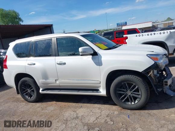 2013 Lexus GX 460 Premium z VIN JTJJM7FX8D5056053, wystawiony jako IAAI lot #42167295 z przebiegiem 189 652 mil mil oraz . Historia ofert i sprzedaży dostępna na DreamBid. Obrazek 13.