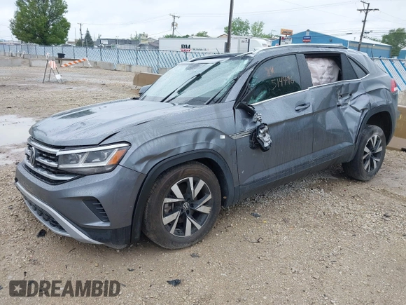 2022 Volkswagen Atlas SE with VIN 1V2LC2CA1NC203536, listed as a IAAI auction lot 42310598 with 28,724 mi miles and . Bid and sale history available at DreamBid. Image 2.