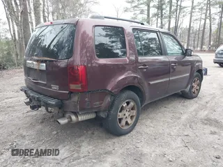 2010 Honda Pilot Touring with VIN 5FNYF4H9XAB040715, listed as a IAAI auction lot 41807334 with 262,786 mi miles and . Bid and sale history available at carsss.com. Image 4.