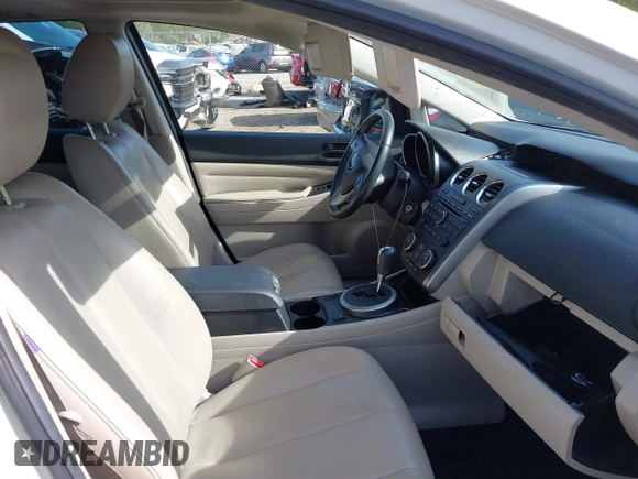2010 Mazda CX-7 Sport with VIN JM3ER2W56A0346749, listed as a IAAI auction lot 42062520 with 214,959 mi miles and . Bid and sale history available at DreamBid. Image 5.