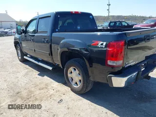 2012 GMC Sierra 1500 SLT with VIN 3GTP2WE70CG134587, listed as a IAAI auction lot 41973632 with 206,378 mi miles and . Bid and sale history available at DreamBid. Image 3.