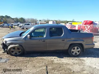 2014 Honda Ridgeline RTL with VIN 5FPYK1F52EB002984, listed as a IAAI auction lot 41347361 with 162,015 mi miles. Bid and sale history available at carsss.com. Image 14.