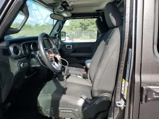 2018 Jeep Wrangler Unlimited Sahara z VIN 1C4HJXEG6JW174944, wystawiony jako Copart lot #54786595 z przebiegiem 81 782 mil mil oraz Szkoda całkowita • Salvage title. Historia ofert i sprzedaży dostępna na DreamBid. Obrazek 7.