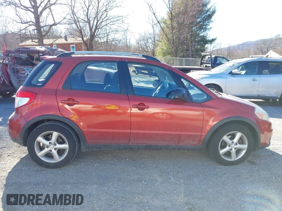 2009 Suzuki SX4 Touring AWD z VIN JS2YB417595100925, wystawiony jako IAAI lot #41693882 z przebiegiem 76 972 mil mil oraz . Historia ofert i sprzedaży dostępna na DreamBid. Obrazek 14.