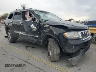 2012 Jeep Grand Cherokee Overland with VIN 1C4RJECT7CC311578, listed as a Copart auction lot 51905715 with 172,980 mi miles and Salvage Title. Bid and sale history available at carsss.com. Image 4.