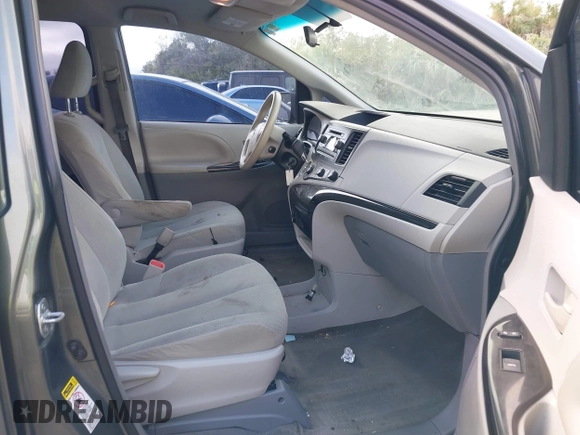2014 Toyota Sienna L with VIN 5TDZK3DC6ES421278, listed as a IAAI auction lot 41178679 with 202,823 mi miles. Bid and sale history available at carsss.com. Image 5.